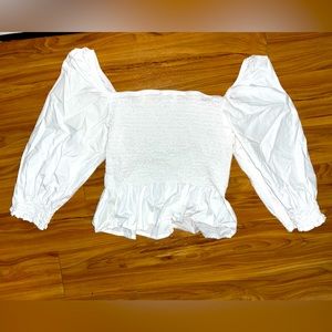 White ruffled top
